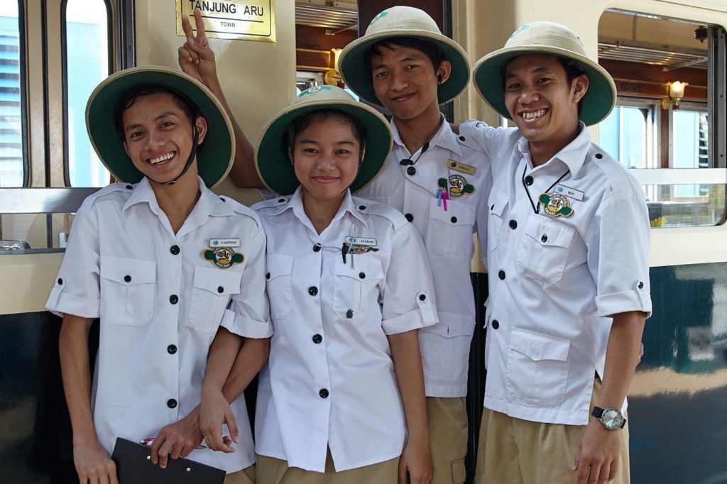 Khakis and pith helmets on The North Borneo Railway