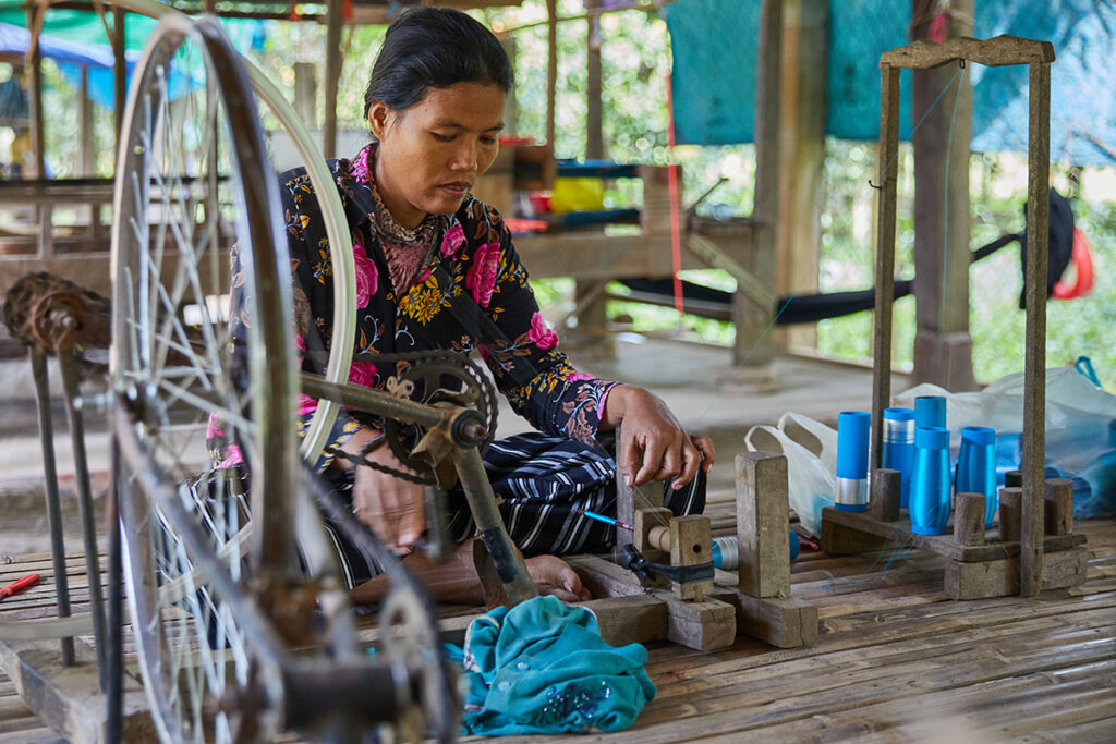 Spinning the thread at silk islands, Koh Dach, Cambodia