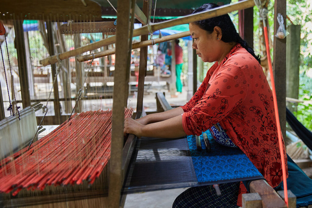 Weaving the fabric at The silk islands of Koh Dach